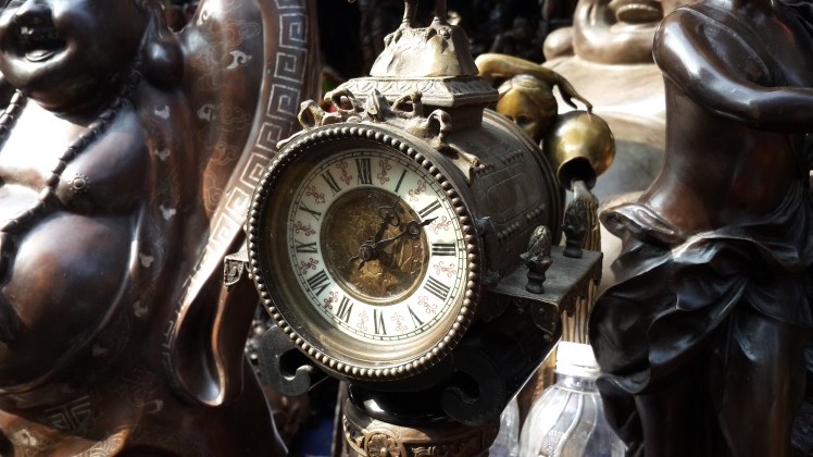 An intricate clock at Hanoi Antique fair